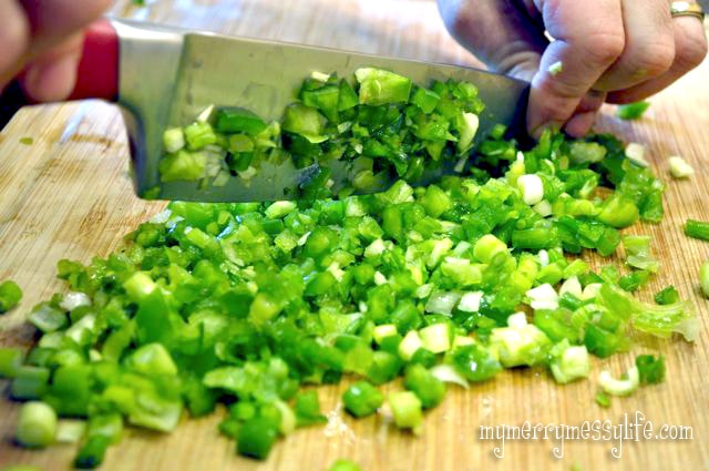 Chopping up the celery for Grilled Turkey Ranch Burgers
