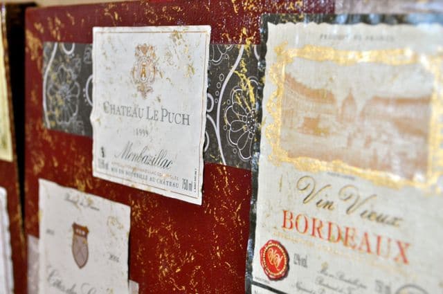 DIY Custom Wall Art Using Wine Bottle Labels and Acrylic Paint