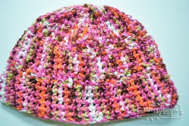 Free Crochet Pattern for a Cherry Lime Beanie using Double Crochet and the Woven Stitch. Made for an adult.