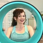 How a yoga wheel can help with back pain and how to use it!