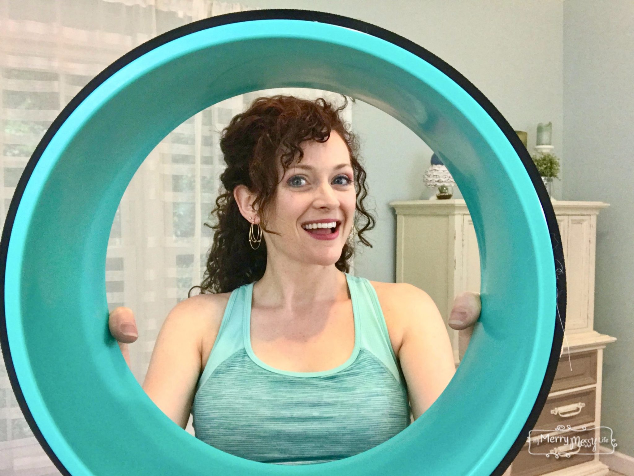 How a yoga wheel can help with back pain and how to use it!