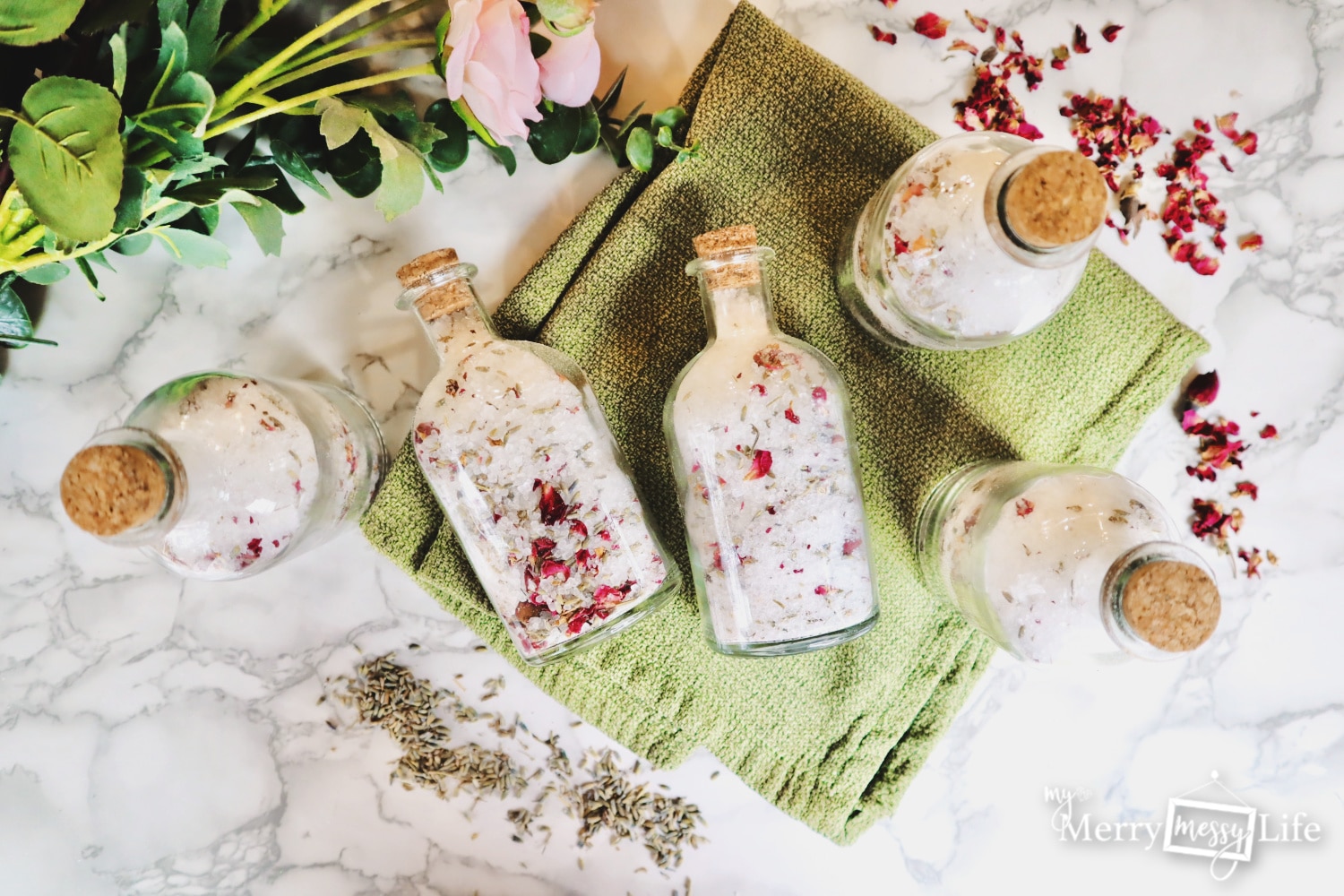 Homemade bath salts recipe with rose and lavender petals